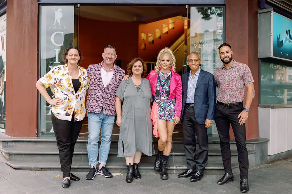 Group of people posing outside