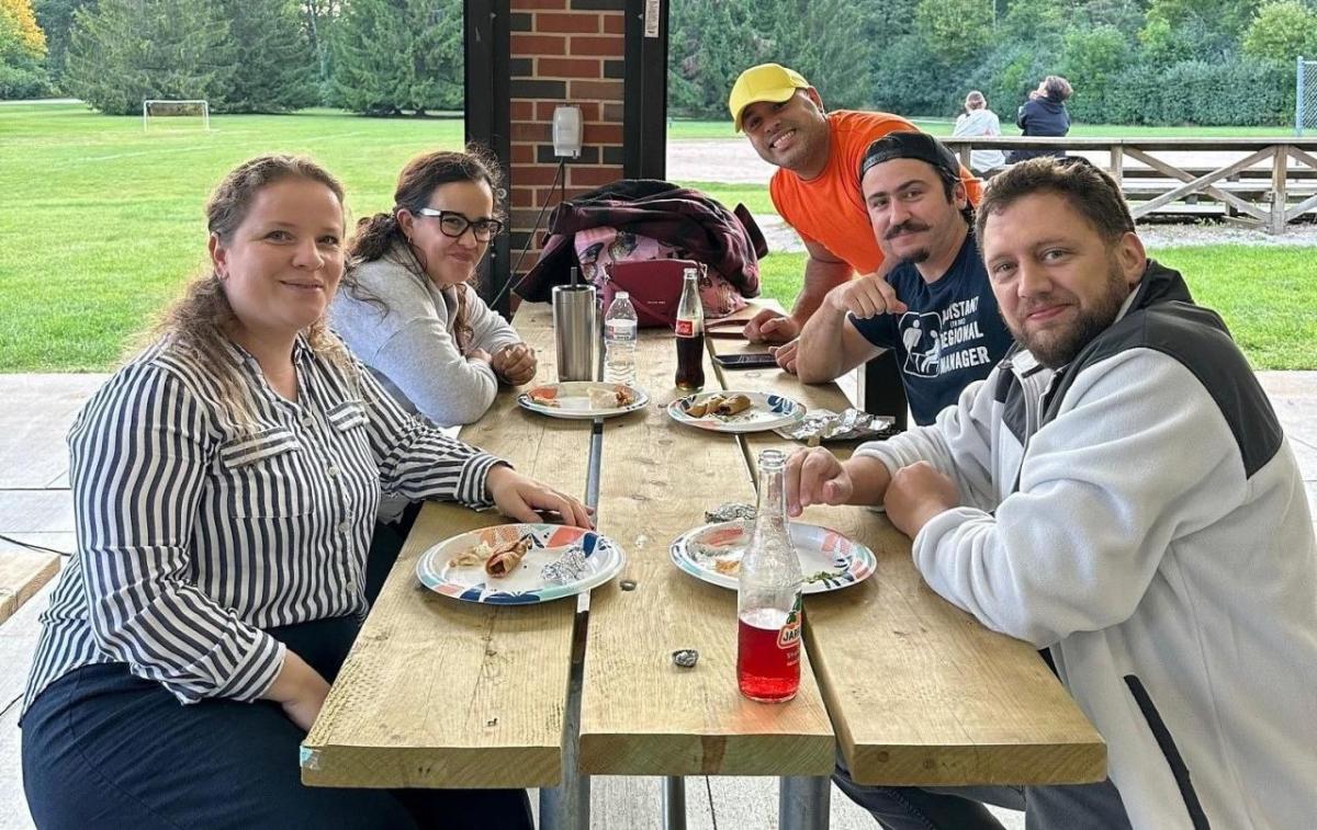 Group eating at a picnic table