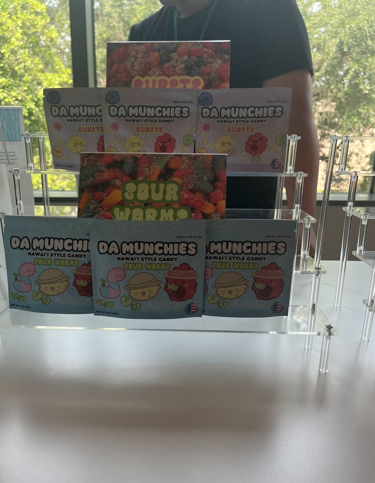 Packaged foods in a rack on a table
