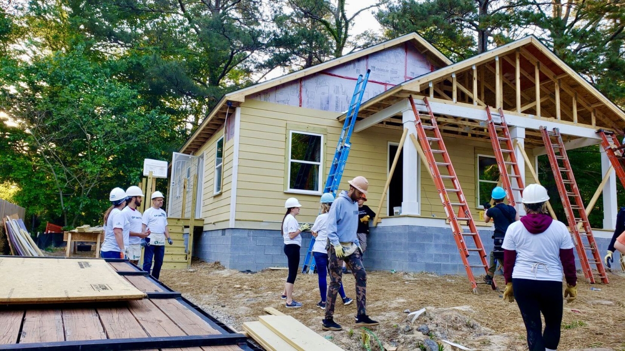 people building a house