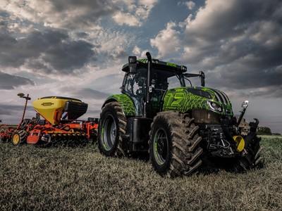 Green tractor in a field