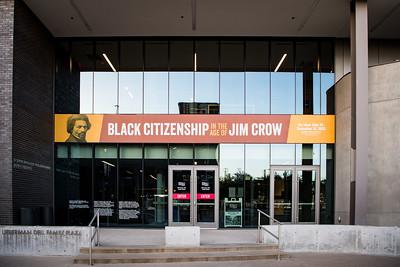 Exterior view of the museum. A banner across the doors "Black Citizenship in the era of Jim Crow"