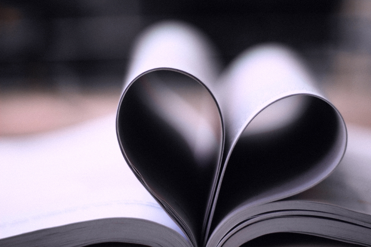 book pages folded to make a heart