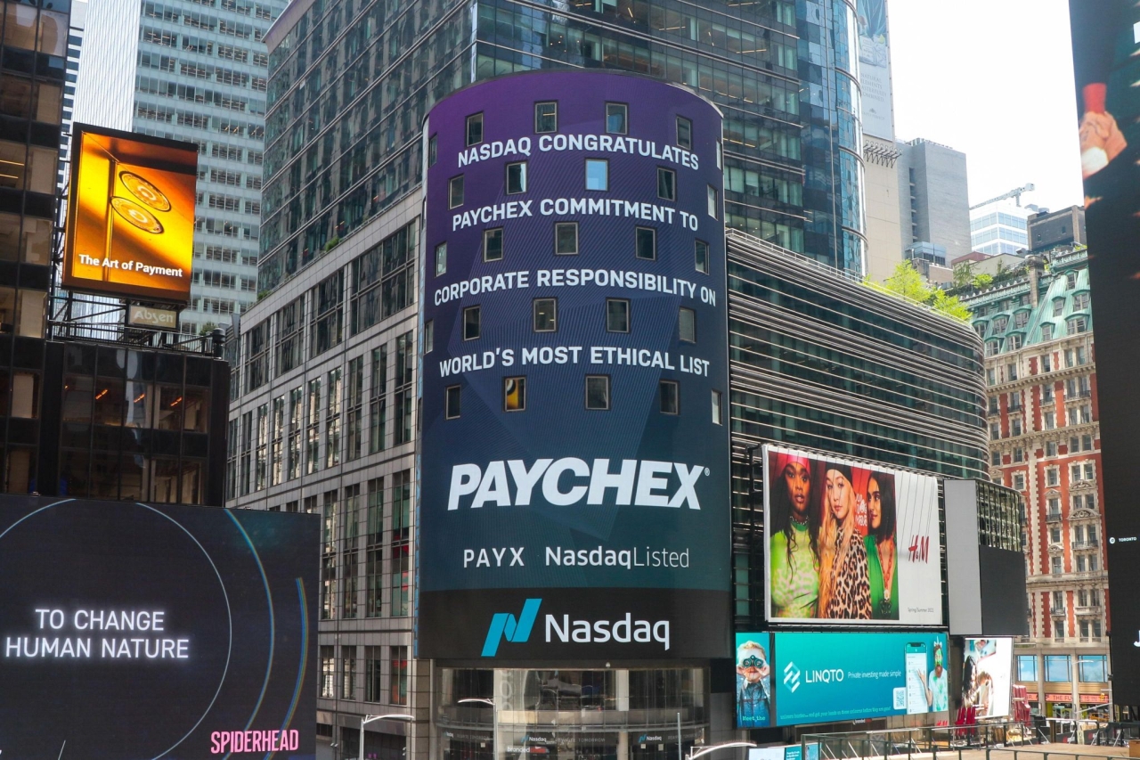 Nasdaq sign in Times Square with "Nasdaq congratulates Paychex commitment to corporate responsibility on world's most ethical list"