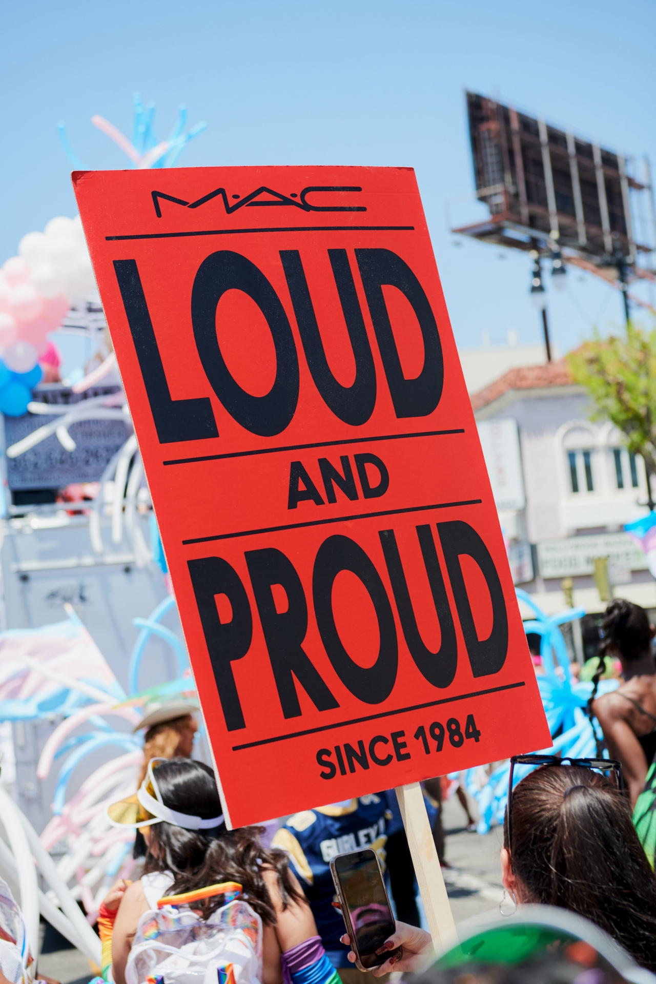 pride parade sign "Loud and Proud"