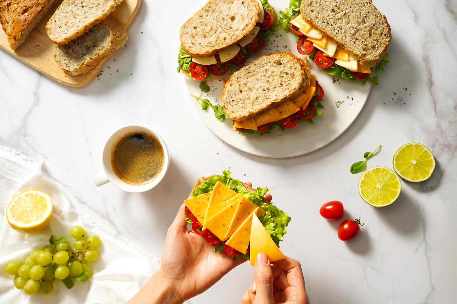 sandwiches with plant-based cheese — if everyone ate a more plant-based diet it would significantly reduce emissions even if they don't go vegan - climate solutions with potential
