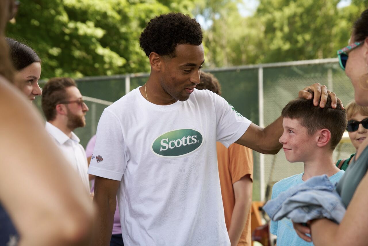 coach with soccer player