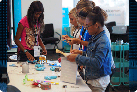 girls assembling a project at a tech camp