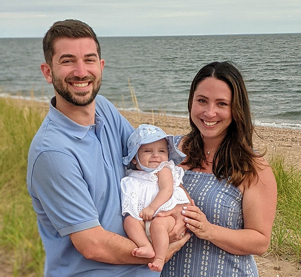 Parents and baby at beach