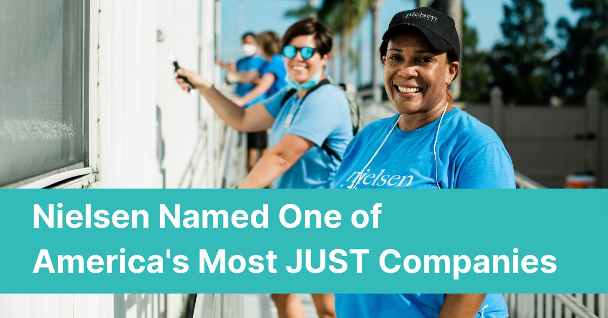Volunteers paint in image that reads: Nielsen named one of America's Most JUST Companies