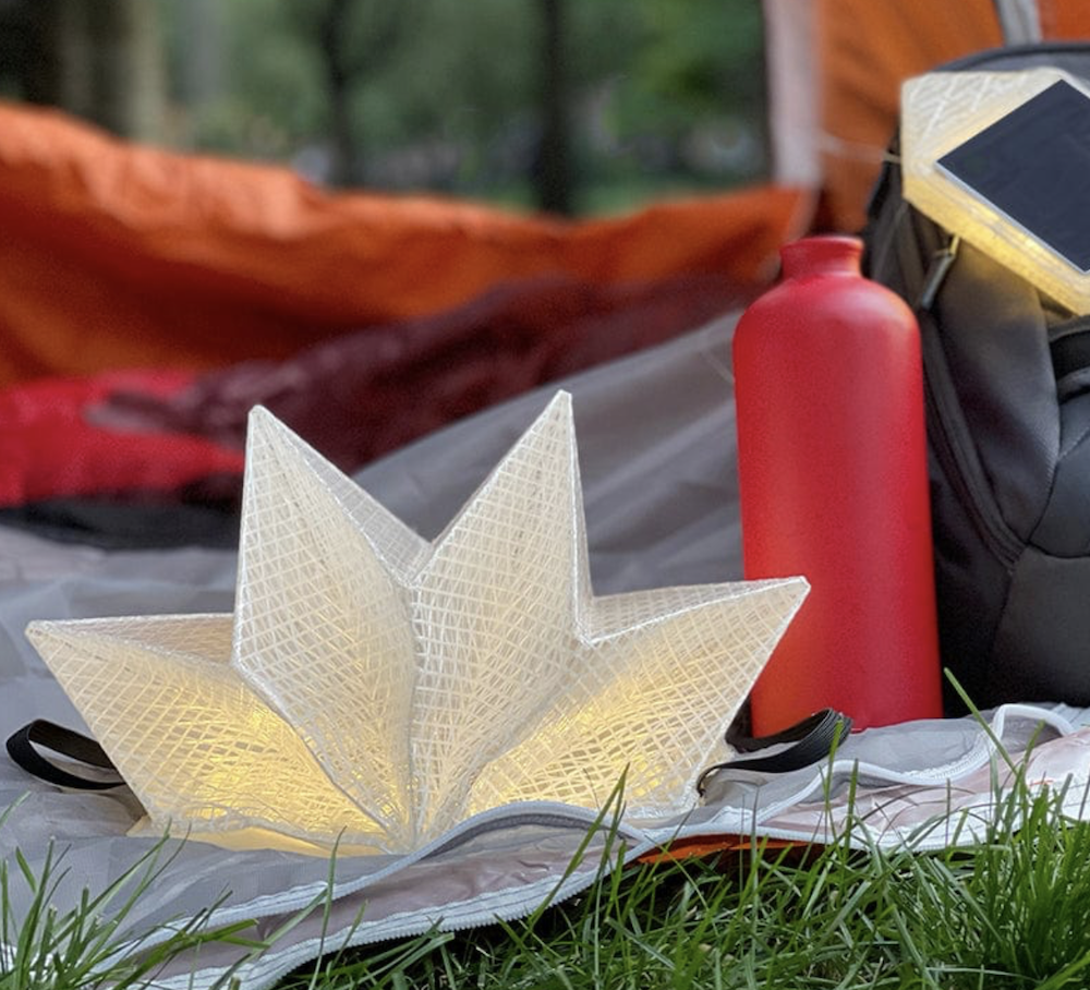 solar lantern and phone charger - sustainable holiday gifts