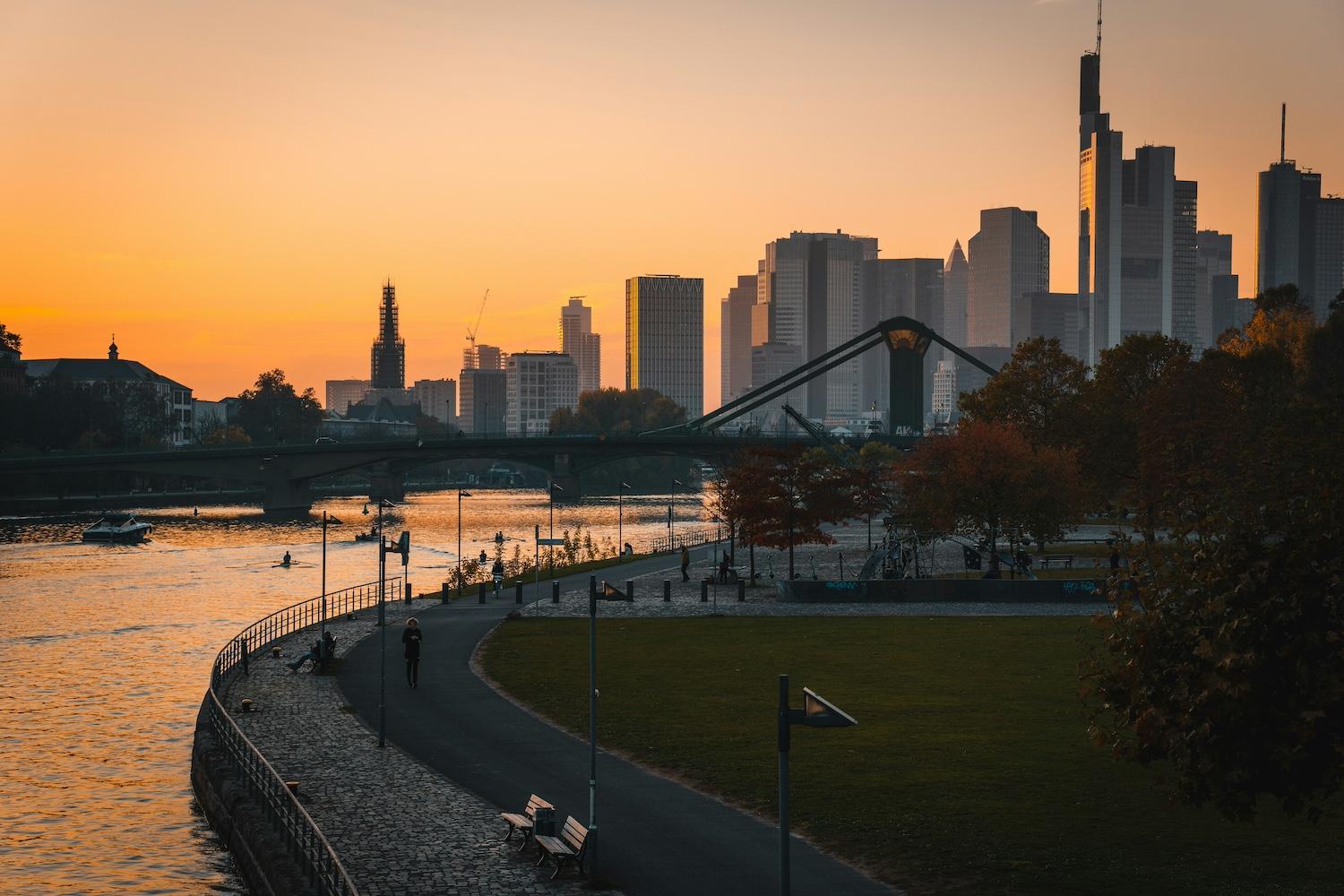 The skyline of Frankfurt, Germany, at sunset — solutions journalism