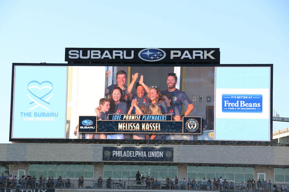subaru and the philadelphia union honor local volunteers with a love promise playmaker award on the jumbotron during a home game