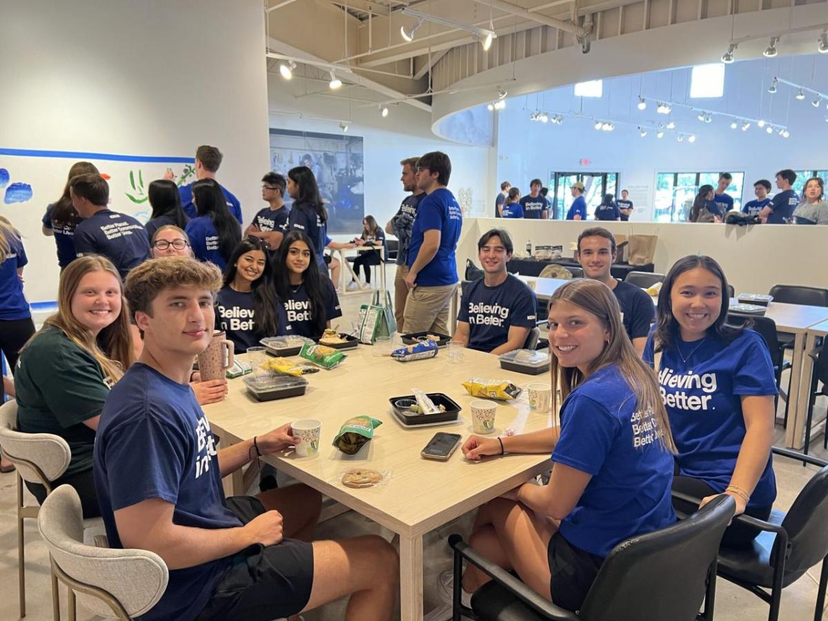 Group of interns sitting at lunch