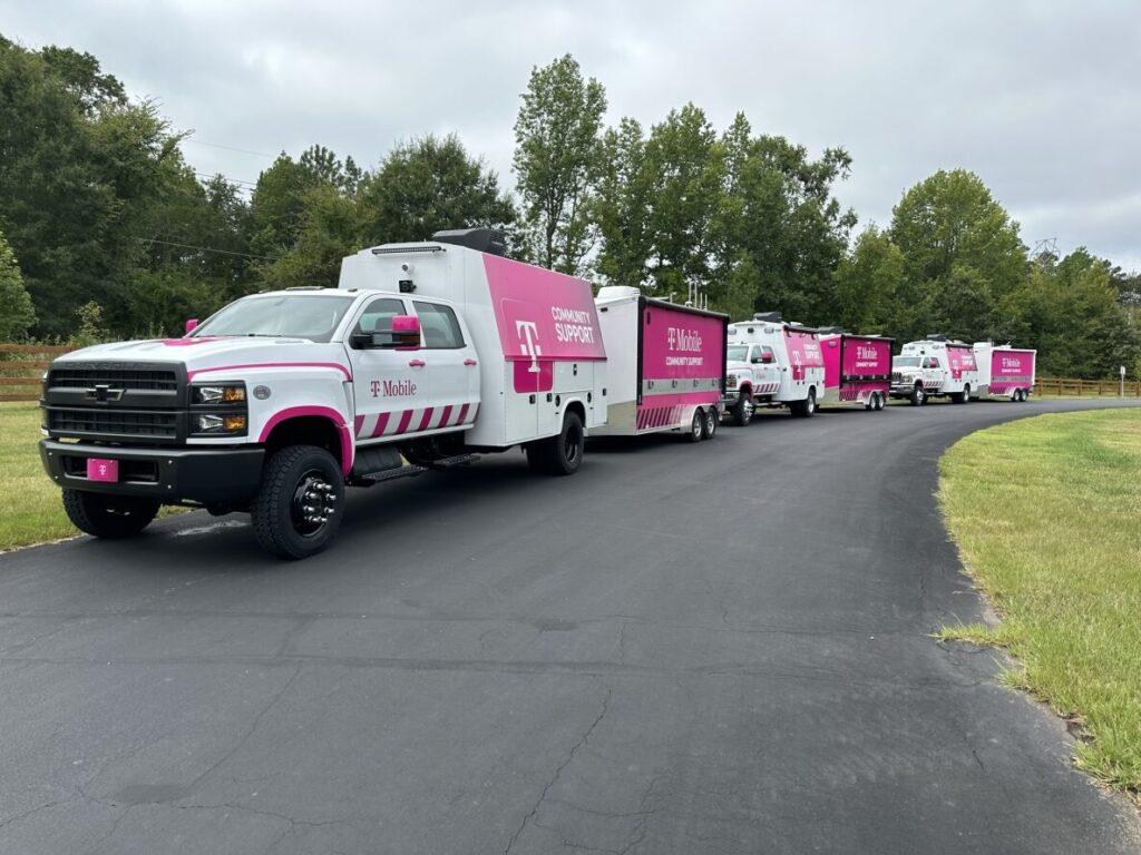 line of T-Mobile trucks