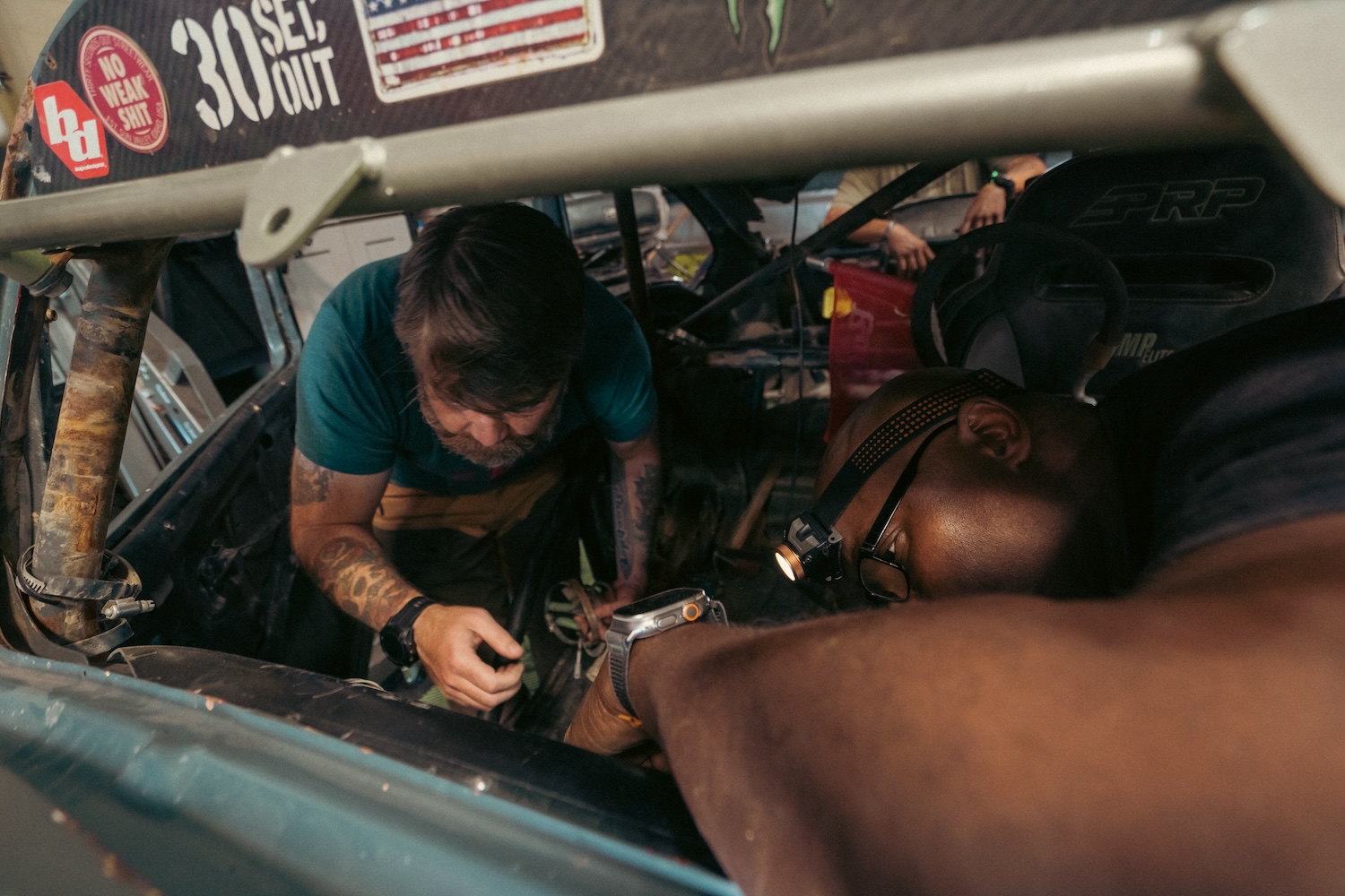 veterans working on car — warrior built