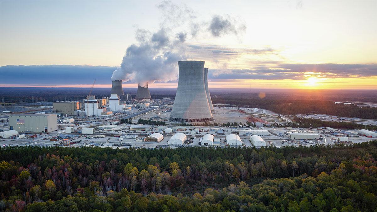 Aerial view of Vogtle power plant. Steam coming from two tall stacks.