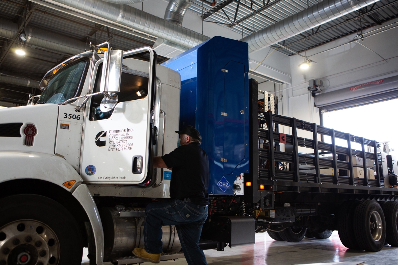 Cummins employee getting into hydrogen truck