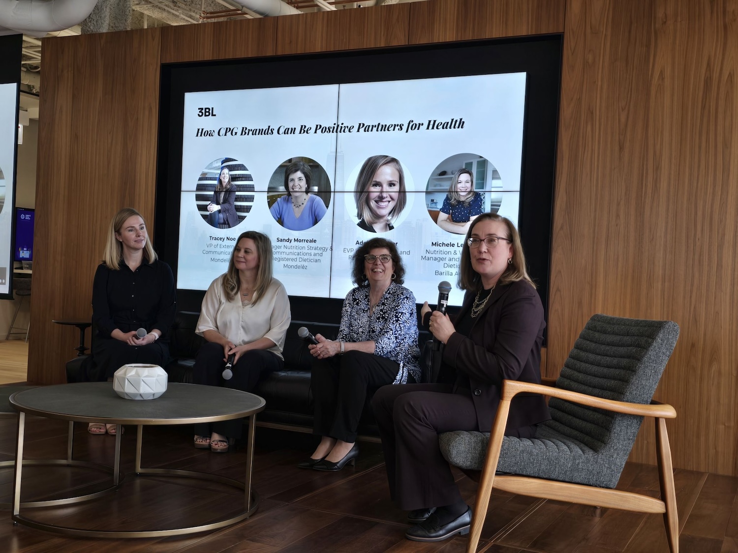 women speak on a panel at Mondelēz International’s headquarters in Chicago