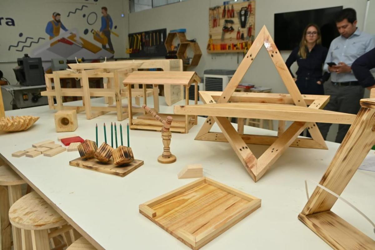 Projects displayed on a table in a workshop.