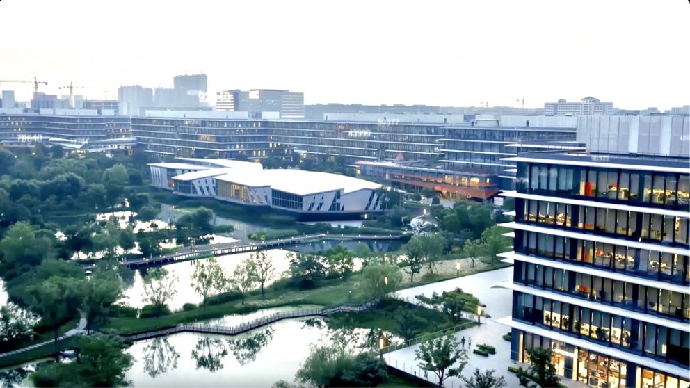 aerial view of Alibaba campus, water featured centrally with walking bridges