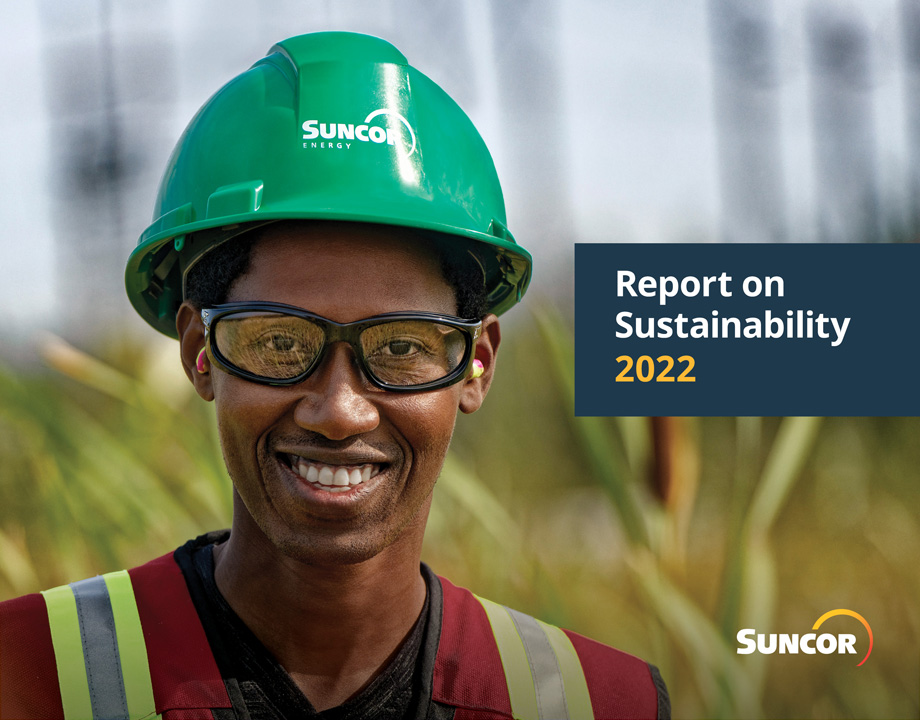 smiling person in hard hat