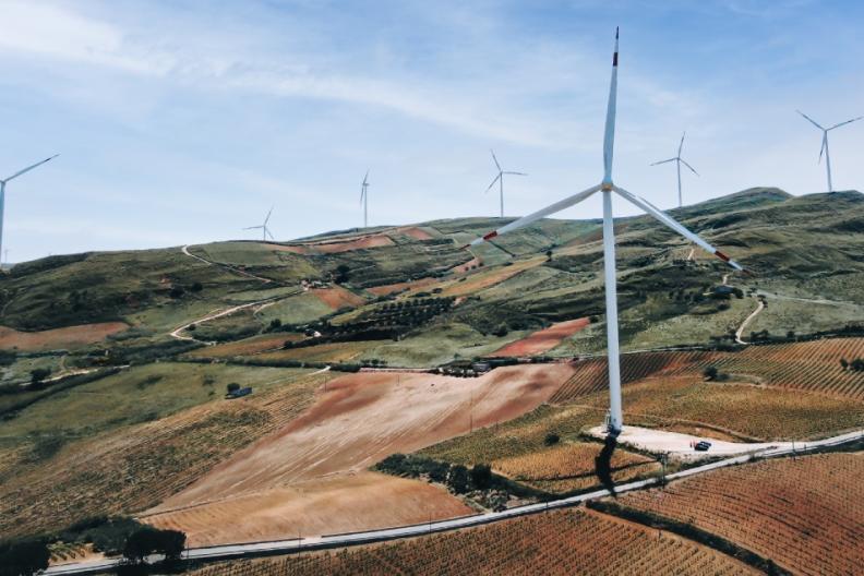 wind turbines on a hill 