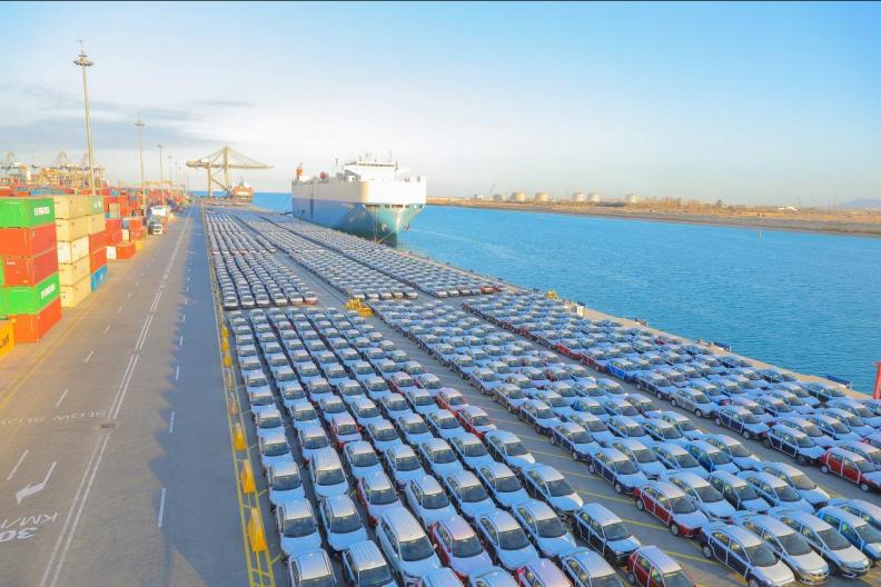 Rows of cars at port, ready to be shipped 