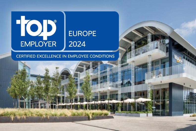 A Whirlpool Corporation building with the Top Employer Europe 2024 logo 