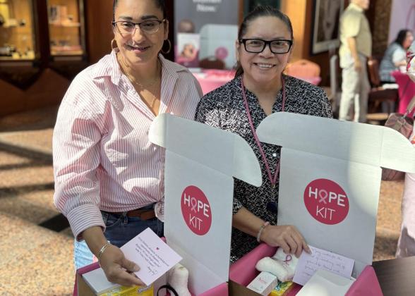 Mary Kay employees embody the Go-Give Spirit, packing HOPE Kits for cancer patients during their Surprise &amp; Delight employee recognition event. (Photo Courtesy: Mary Kay Inc.)