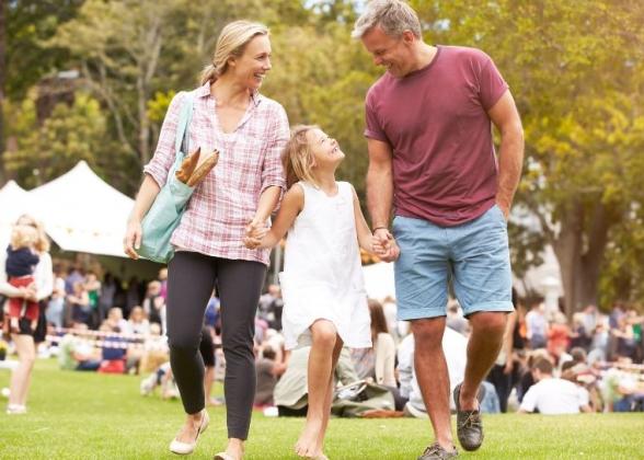 A family enjoying an outside event