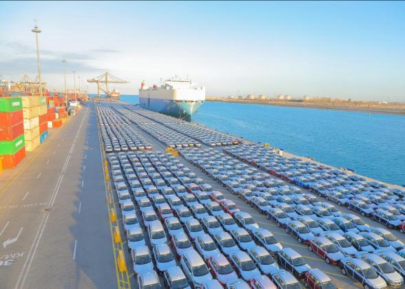 Rows of cars at port, ready to be shipped