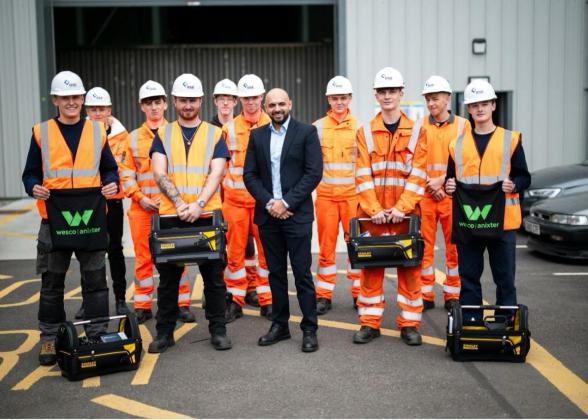 Picture: Zubi Hussain, Wesco Business Development Manager EES UK and new RSE apprentice cohort with their toolkits