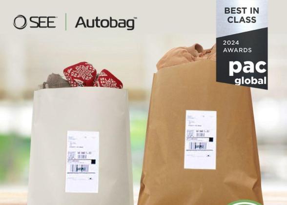 Two shipping bags with items inside on a flat wooden surface. SEE and Autobag logos. &quot;Best in Class 2024 Awards pac Global&quot; badge and recycling symbol in the corner.