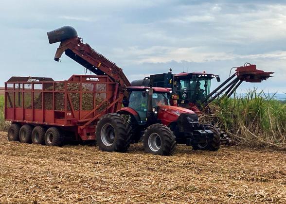 two tractors in a field