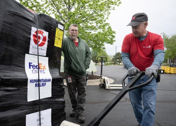 person moving relief materials