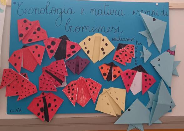 A paper poster with various handmade animals