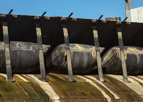 Duke Energy installed new &quot;bladder gates,&quot; each standing approximately 5 feet tall, to enhance spillway control at Blewett Falls. These gates can be deflated to facilitate water movement during high-water events.