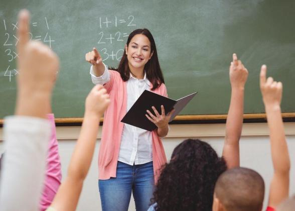 teacher in front of classroom