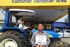 New Holland Agriculture Helps Myanmar Farmers Fight Malaria Image.