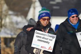 Consumers Energy Employees Walk in Michigan Communities to Help Residents Stay Warm This Winter Image.