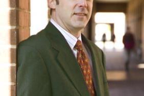 Nationally Known Executive Recruiter Authors 'Tailoring the Green Suit' Urges Millions of Business Professionals to Trade in Their Gray Pinstripes for Green Ones Image.