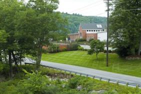 Monadnock Takes Concrete Actions to Reduce Environmental Impacts  100 Percent Clean, Renewable Electricity Carbon Neutral Manufacturing Image.