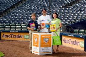 AutoTrader.com, Area Chevrolet Dealers, the Atlanta Braves and Baseball Legend John Smoltz Team Up to Help 'Drive Away Hunger' in Atlanta Image.