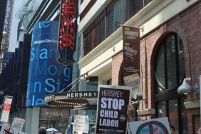 Major Rally in Times Square Calls on Hershey Company to Stop Using Child Labor Chocolate Image.