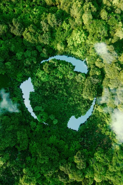 Abstract lakes that look like a recycling symbol in a jungle - symbolizing the circular economy
