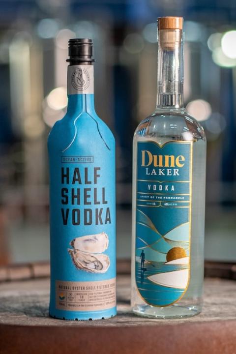 Distillery 98 Half Shell Vodka and Dune Laker vodka in glass bottles and paper bottles