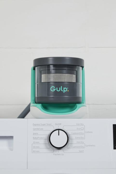 The Gulp microfiber filter sits on top of a washing machine — this device captures Microplastic Particles