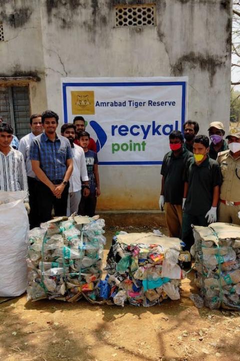 Members of the Recykal team with recyclable materials at a recycling drop off point at the Amrabad Tiger Reserve in India. 