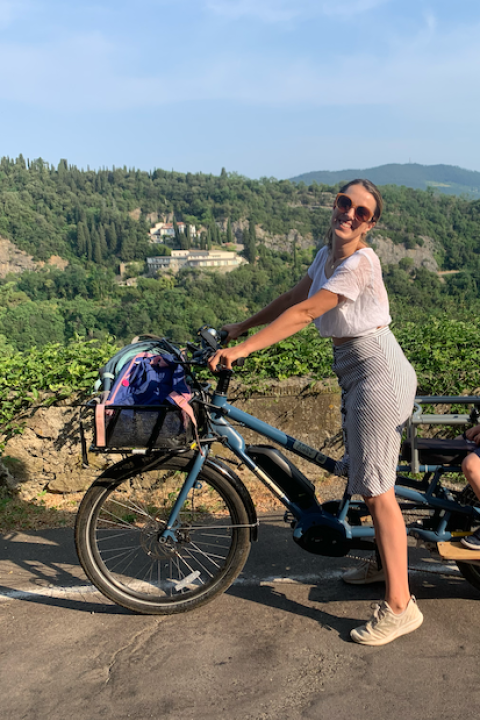 car-free family using a cargo bike in florence italy